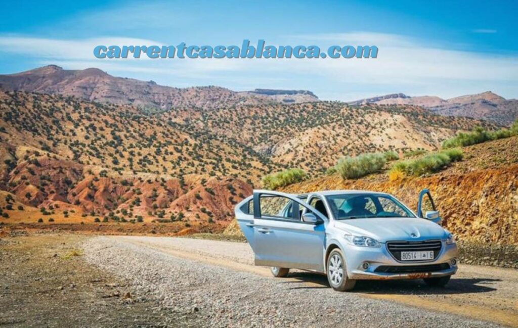 Scenic Dadès Gorge road with red cliffs and desert landscape